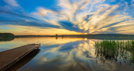 Canvas Print - Beautiful panorama landscape with sunrise over the water lake