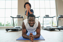 African American Family Dad And Kid Workout In Prank Pose In Sport Club For Health And Wellbeing