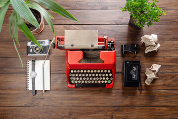 Poster - Journalism or blogging concept - vintage typewriter on the wooden desk, top view