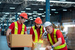 © Montri - worker person working with safety in warehouse logistic factory, business manufacturing industry occupation concept, goods product box distribution. Storehouse employee in uniform. warehouse worker.