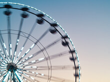Illuminated Ferris Wheel In Night. Summer Fun For The Whole Family In The Amusement Park