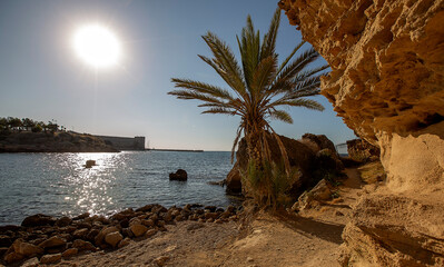 Wall Mural - Republic of Cyprus. Turquoise Mediterranean sea.. Sea shore with small stones.