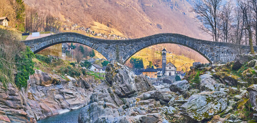 Canvas Print - The church of Lavertezzo in arch of, the Salt Bridge (Ponte degli Salti), Valle Verzasca, Switzerland