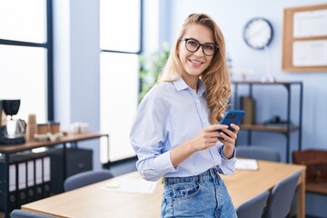 Poster - Young blonde woman business worker using smartphone at office