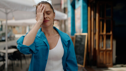 Sticker - Young woman stressed standing at street