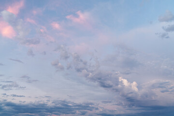 Wall Mural - beautiful high resolution sunset sky replacement background with a layer of low lying cumulus clouds