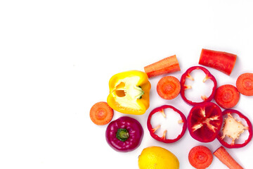 Wall Mural - Healthy red and yellow fruits isolated on white background, Healthy Food in differents cut of brocerli, carrots, lemons, gourd, sweet bell peppers, and with pace for text templates