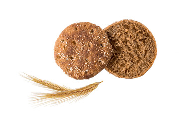 Wall Mural - Slices of whole grain rye traditional scandinavian sandwich bread with spikelets flying isolated on white background. Healthy crusty toast bread for breakfast.