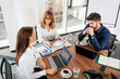 © sepy - Shot of a group of business people having a meeting in a conference room