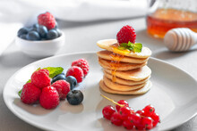 Food For Breakfast Healthy Eating. Pancakes Without Butter With Berries. Food For Vegetarians And For Dieting. American Pancakes Mini