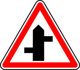 Sticker - Vector graphic of a uk staggered junction ahead road sign. It consists of a depiction of the road layout contained within a red triangle