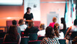 © kasto - Woman giving presentation on business conference event.