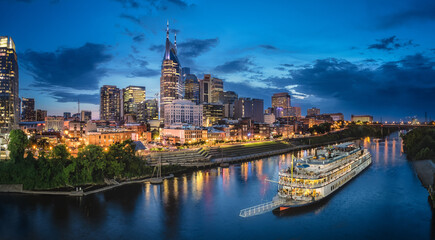 Wall Mural - nashville skyline with river and sunset
