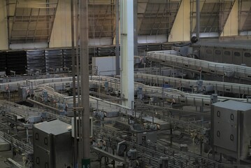 Canvas Print - High angle shot of the interior of a factory with machinery