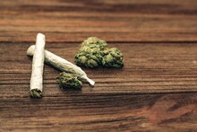 Shot Of Marijuana Joint With Buds Inflorescences
