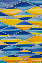 Sticker - Abstract ceramic background. Italian traditional patterns on tiles, handmade craft painting - rhombuses, ovals, blue and yellow mosaic.