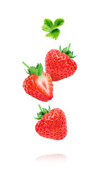 Wall Mural - Strawberry berries isolated on white background. Whole and cut half of falling strawberries