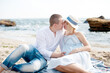 © LP Design - Happy future parents couple have a rest near sea