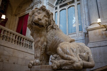 Wall Mural - Sculpture of a male lion inside the luxurious Royal Palace of Madrid