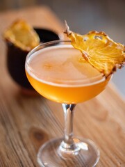 Sticker - Vertical shot of a glass of cocktail served with a dried orange slice