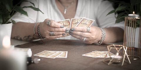 Concept of psychic advisor or ways of divination with cards.