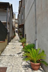 Poster - Vertical shot of a narrow street in Caiazzo, Italy