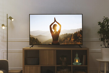 Wall Mural - Modern TV set on wooden stand in room