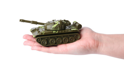 Wall Mural - Man with toy tank on white background, closeup