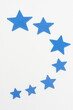 © lurialur - Seven blue stars on white background