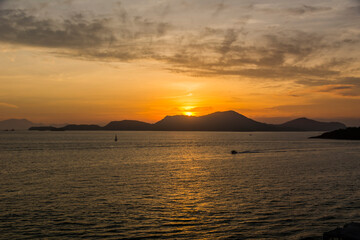 Sunset over the sea at the coast of Angra dos Reis town, State of Rio de Janeiro, Brazil. Photo taken with Nikon D7100, 18-200 lens, at 29mm, 1/125 f 6.3 ISO 100. Date: Dec 28, 2016