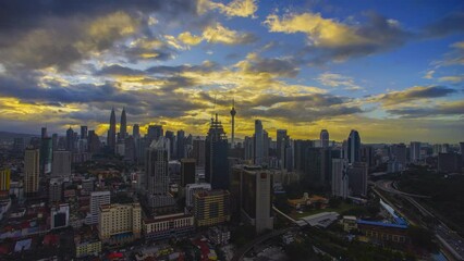 Wall Mural - 4K  Time-lapse of Kuala Lumpur city during sunset. Tilt Down effect