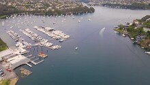 Aerial Drone Pullback Reverse View Of Spit Bridge Across The Middle Harbour At The Spit Between Mosman And Seaforth, Sydney, NSW, Australia 