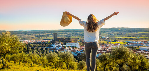 woman enjoying panoramic view of Alentejo region- Portugal,  Portel