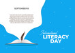 International literacy day banner poster with feather and opened book on blue white color background.