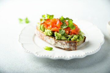 Canvas Print - Healthy avocado toast with salmon