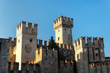 Sirmione Ancient Town Tourist Centre On Lake Garda, Lombardy, North Italy. Gateway And Keep Towers Of 13 C. Scaliger Castle