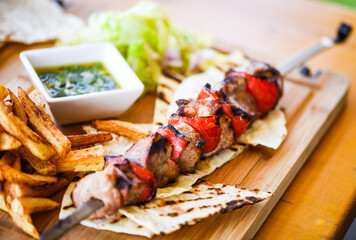 Wall Mural - tasty greek souvlaki skier with fresh vegetables