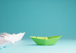 © Andreas Berheide - New ideas, creativity and various innovative solutions or leadership, ecology concept with paper boats