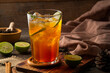 Thai Soft drink,Lime Iced Tea,black tea with lime juice and sugar,garnished with lime slices and mint in glass