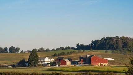 Wall Mural - Amish farm at the base of a hill in the countryside of Holmes County, Ohio