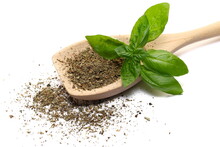 Dry Chopped Basil In Wooden Spoon And Fresh Basil Green Leaves Isolated On White  