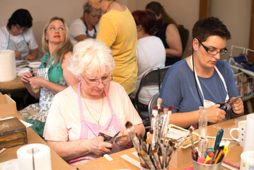 Wall Mural - Women in art workshop making decoupage boxes