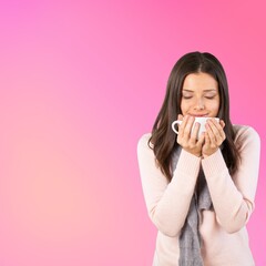 Wall Mural - Caucasian woman holding a mug on background