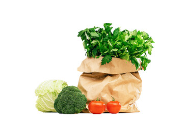 Wall Mural - Fresh green vegetables isolated on white. Banner with copy space. Green vegetarian diet or cuisine. Broccoli cabbage and celery. Grocery delivery or shopping online. Green diet and tomatoes