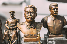 Soviet Leader Josef Stalin. Concept Of Nostalgia For Soviet Union. Miniature Bronze Figurines Of Joseph Stalin.