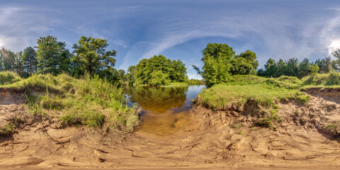 Wall Mural - full seamless hdri 360 panorama view on sand bank of river near forest in equirectangular spherical projection as background for vr content