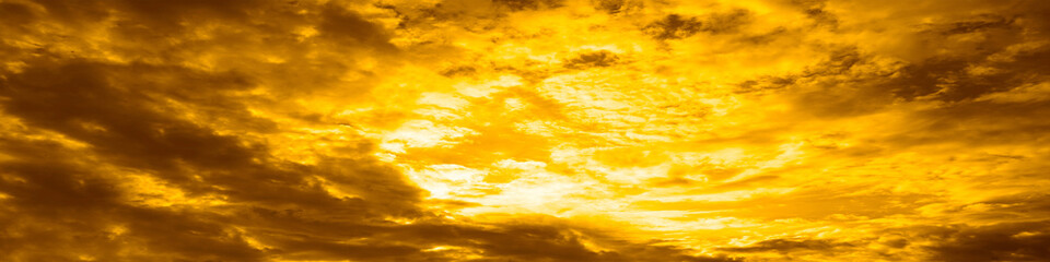 Wall Mural - gray yellow orange sky with dark gloomy storm clouds. dramatic skies background with space for desig