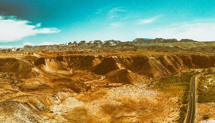 Poster - Road across the canyon, panoramic aerial view at sunset