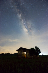 Wall Mural - shed under milky way galaxy lampang thailand, universe galaxy milky way time lapse, dark milky way, 