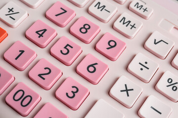 Canvas Print - Closeup view of pink calculator as background